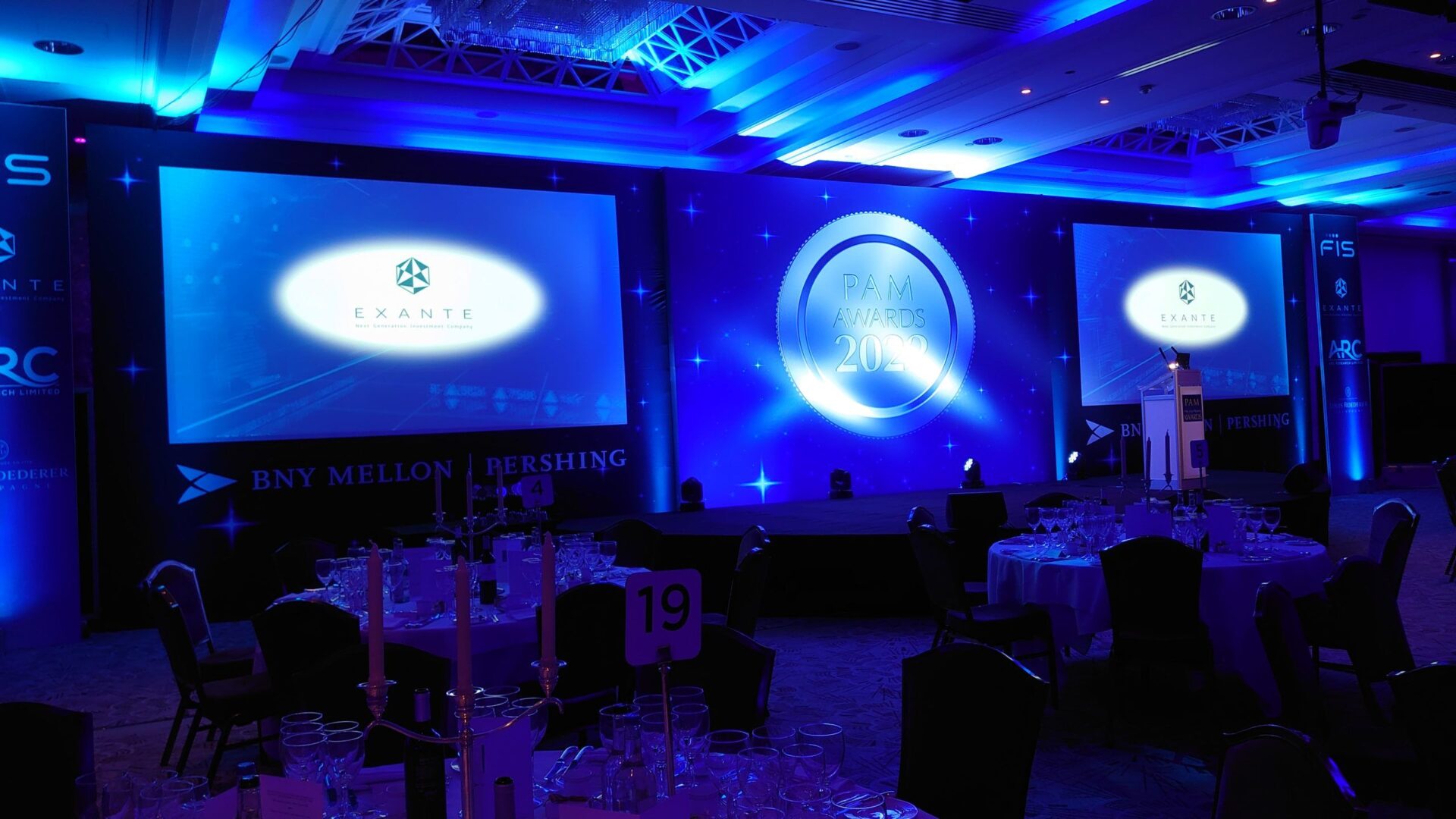 Elegant awards ceremony with blue lighting